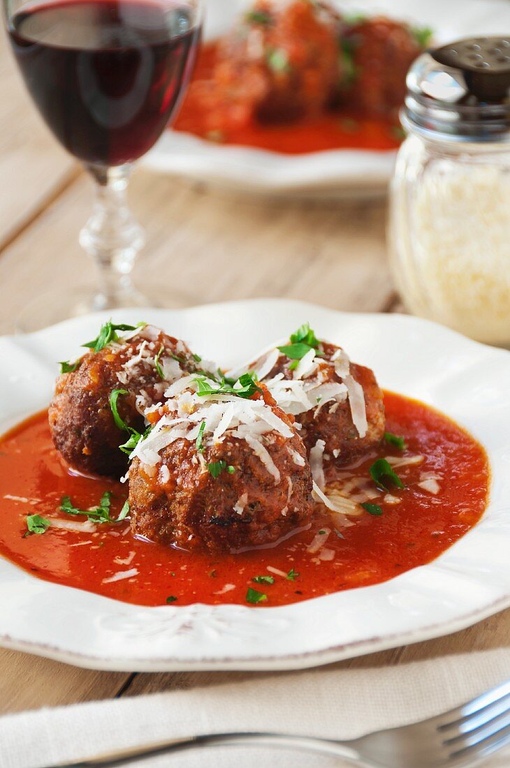 Italian Pork Meatballs Covered with Tomato Sauce and Romano Cheese