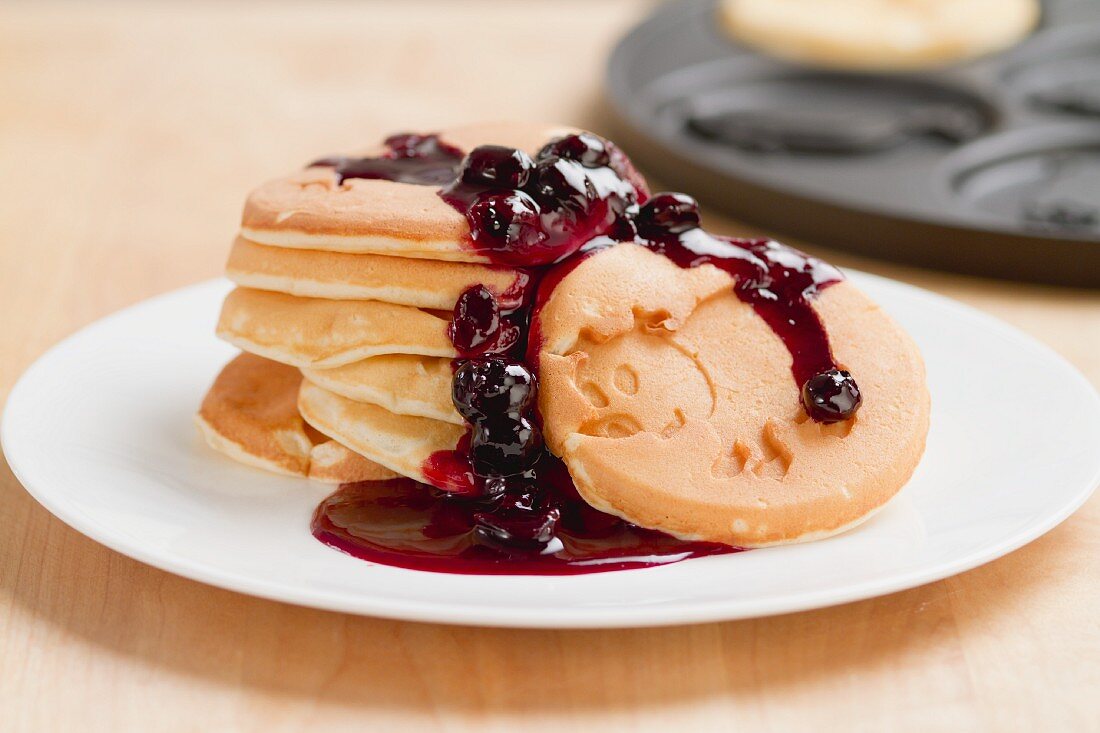 Pancakes with blueberry sauce