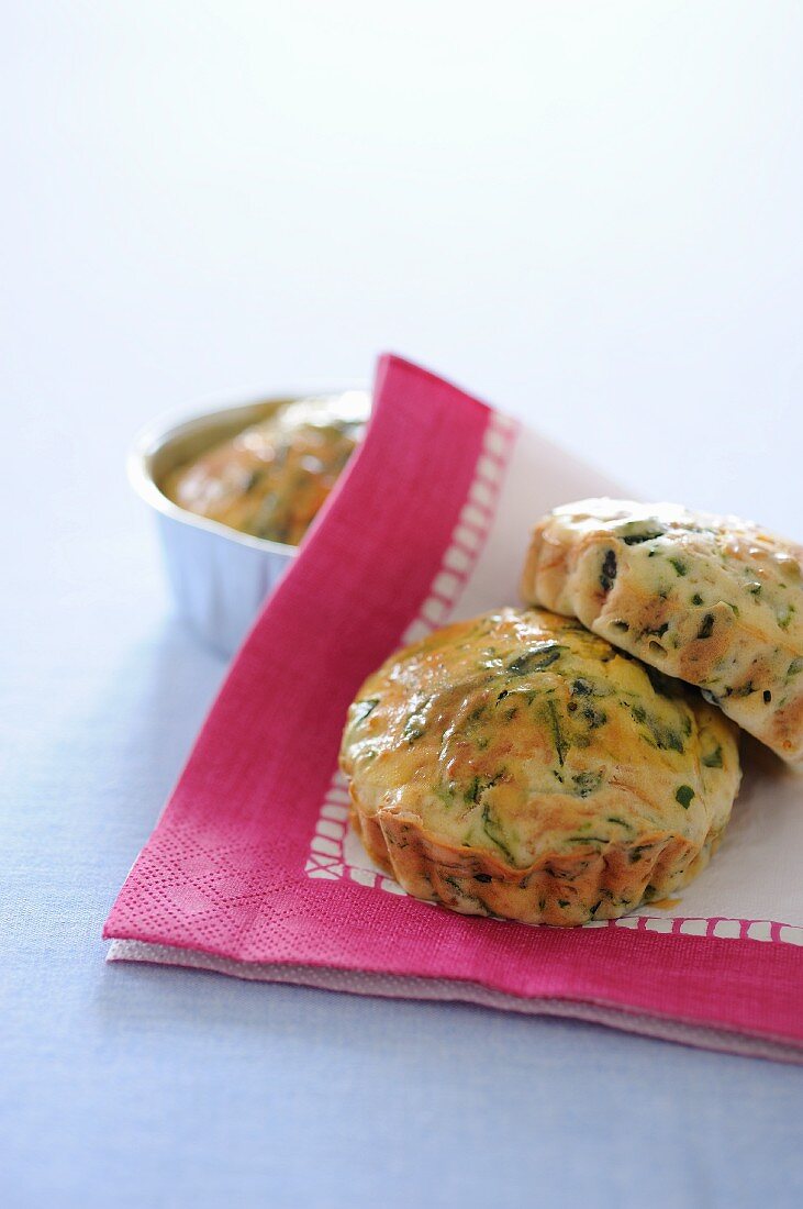 Spinach muffins on a napkin