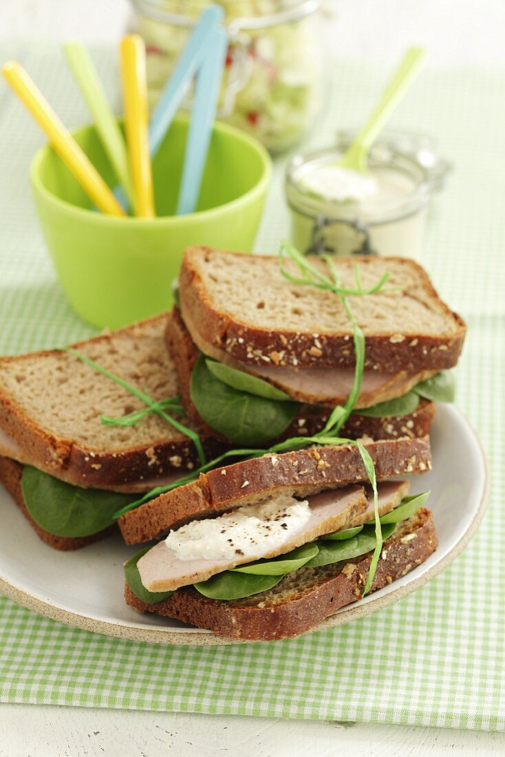 Roast beef sandwiches with fresh baby spinach
