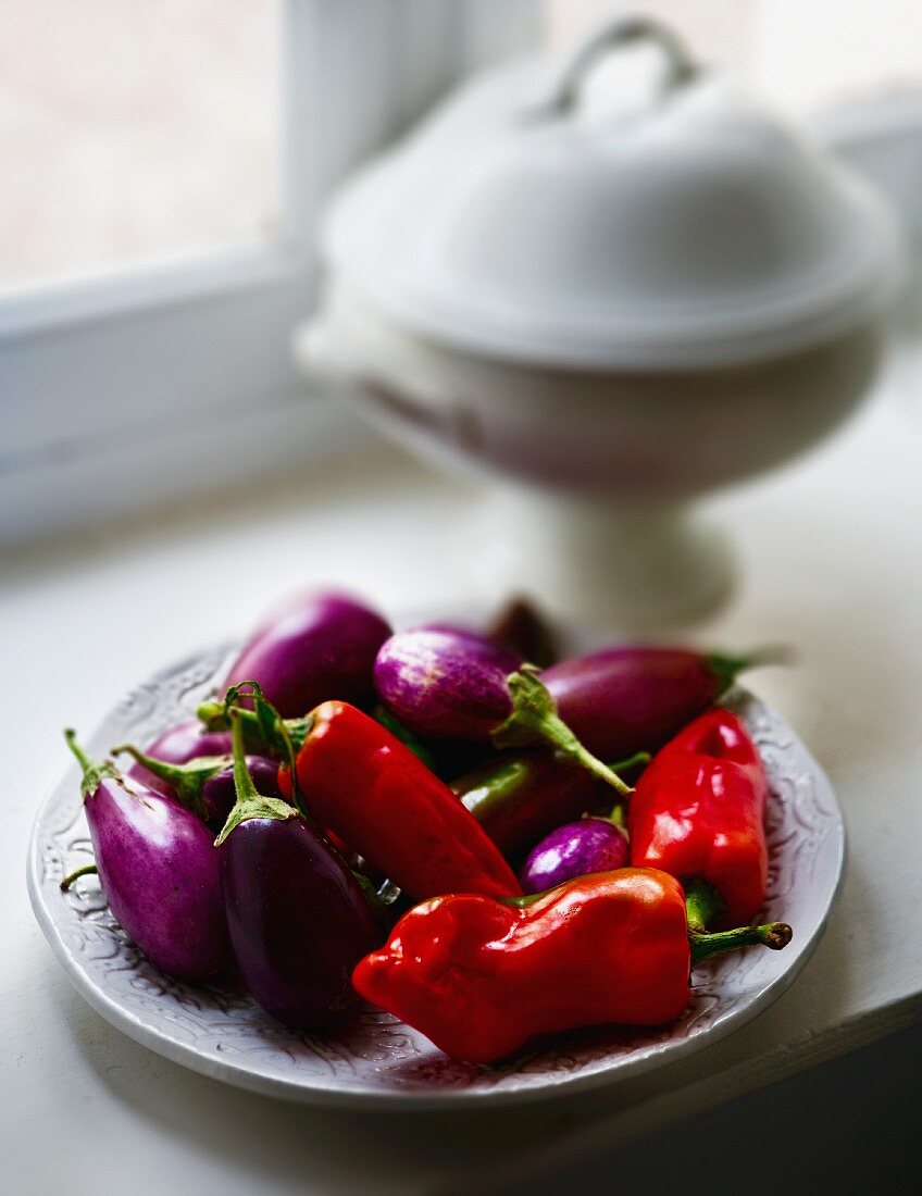 Peppers and aubergines on a plate