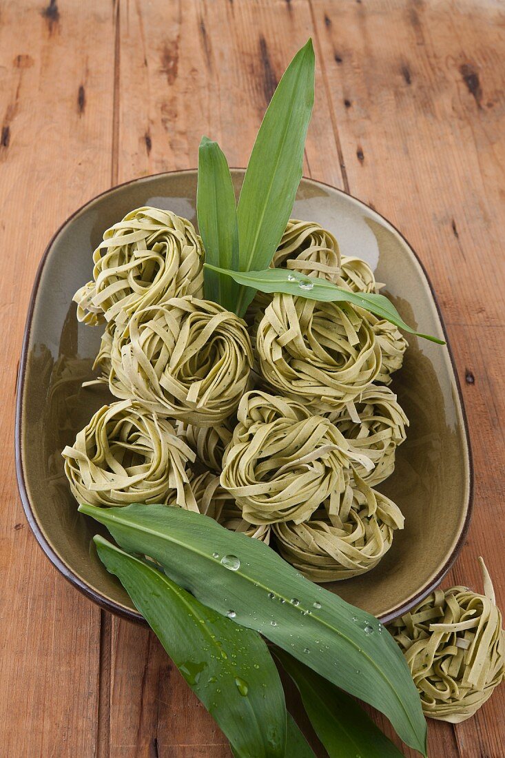 Ramson pasta nests of a plate