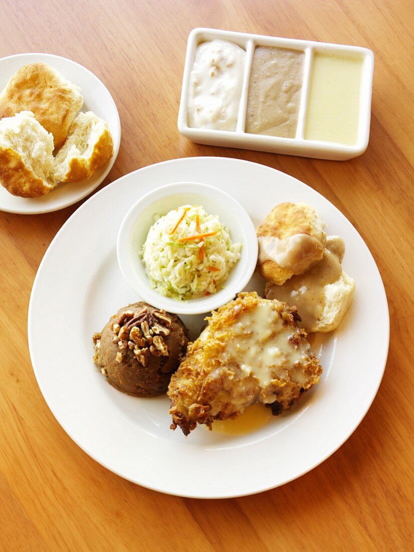 Fried Chicken with Slaw, Brown Sugar Sweet Potatoes and a Biscuit and Gravy;Gravy Sampler