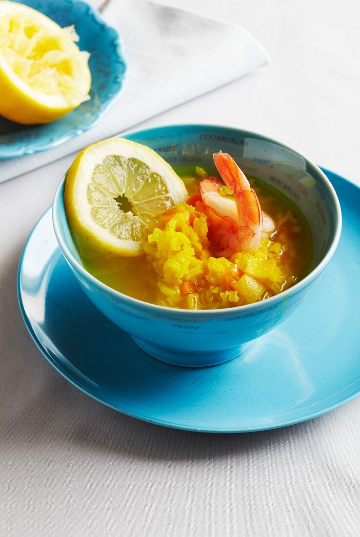 Lemon and rice soup with prawns