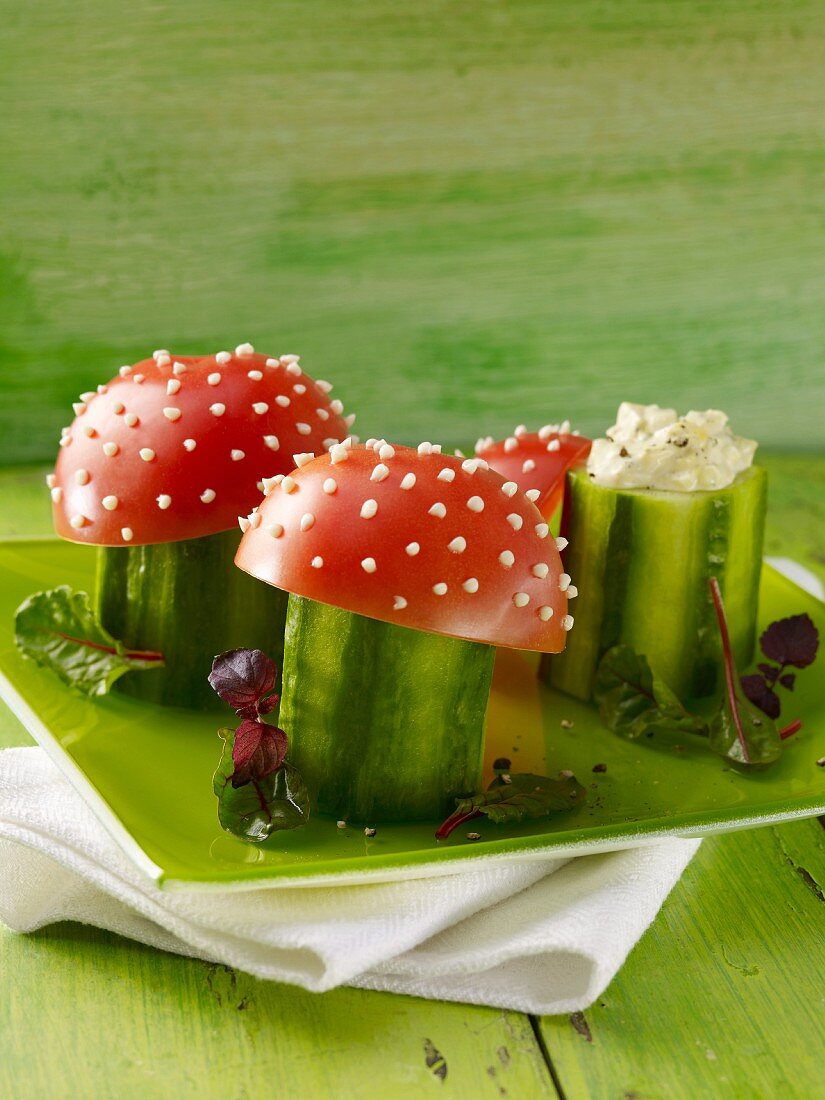 Toadstools: cucumber and egg salad topped with tomato halves