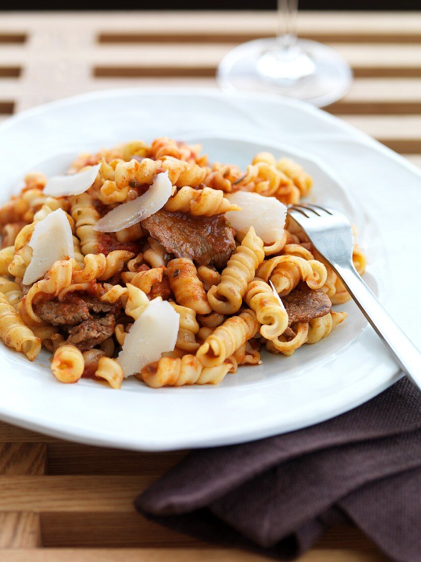 Torchietti al ragù (pasta with beef and Parmesan cheese)