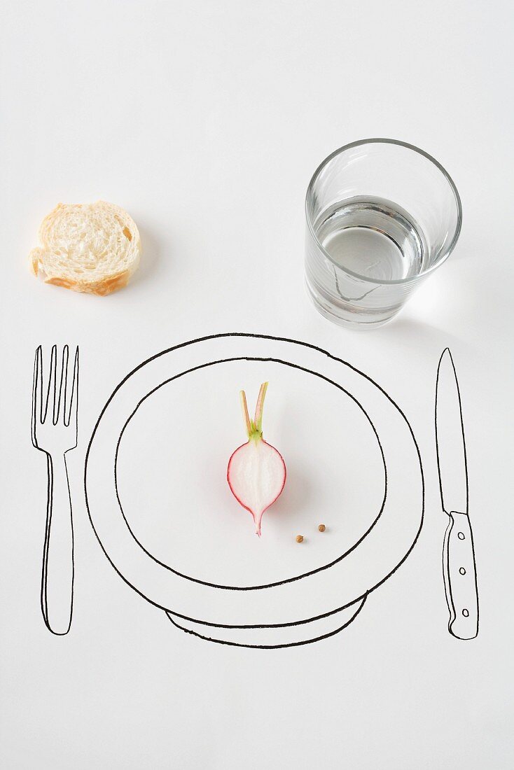 Place setting with half a radish and a small piece of bread
