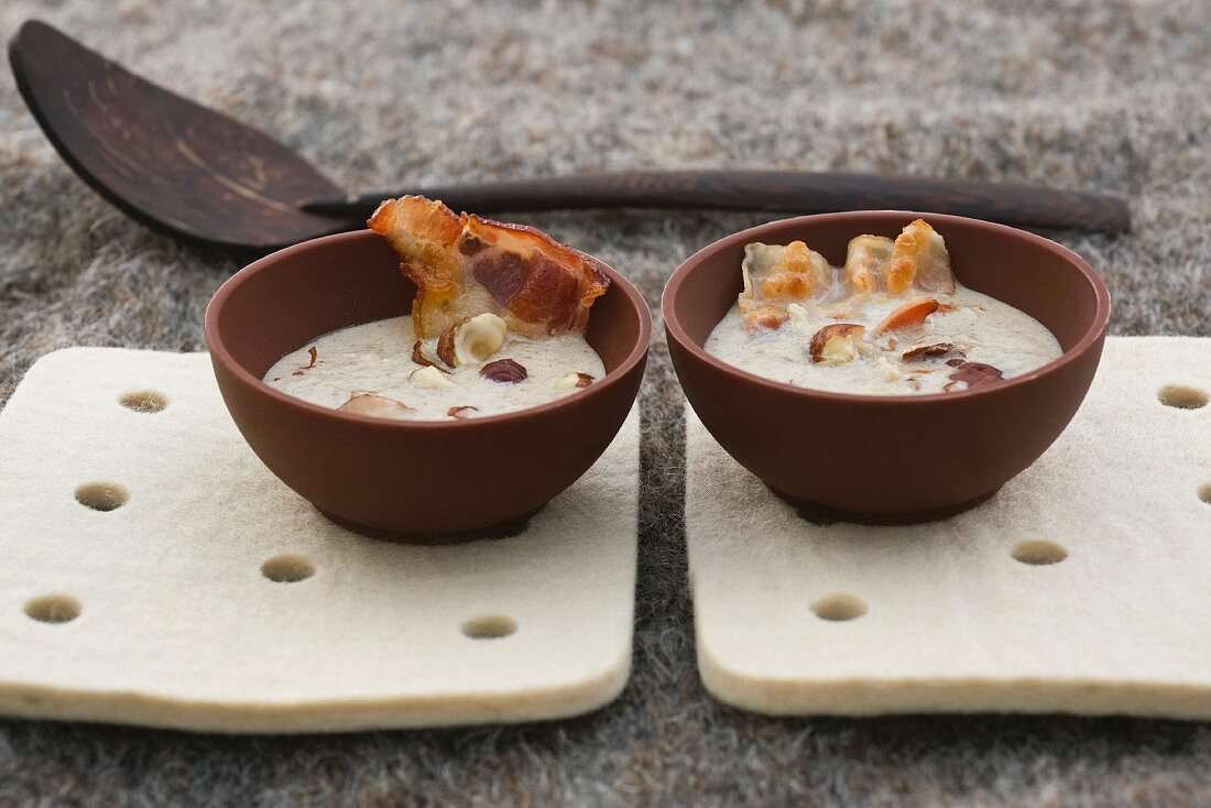 Cream of mushroom soup with smoked bacon and hazelnuts