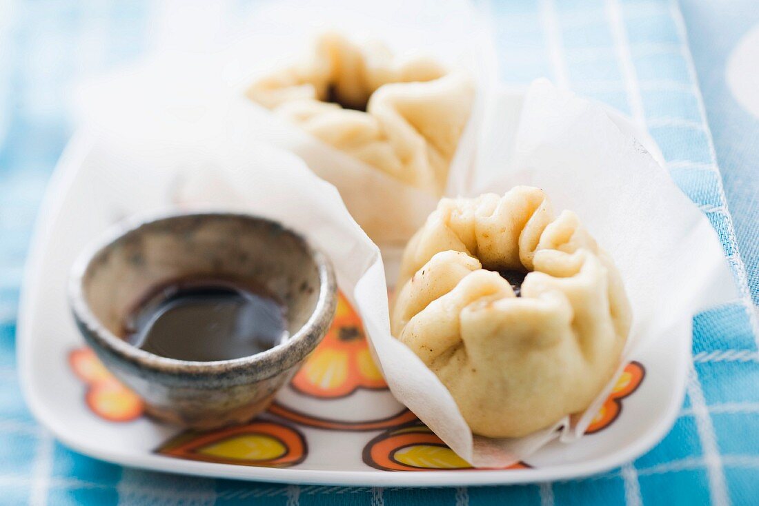 Baozi (steamed dough parcels, China) filled with pork