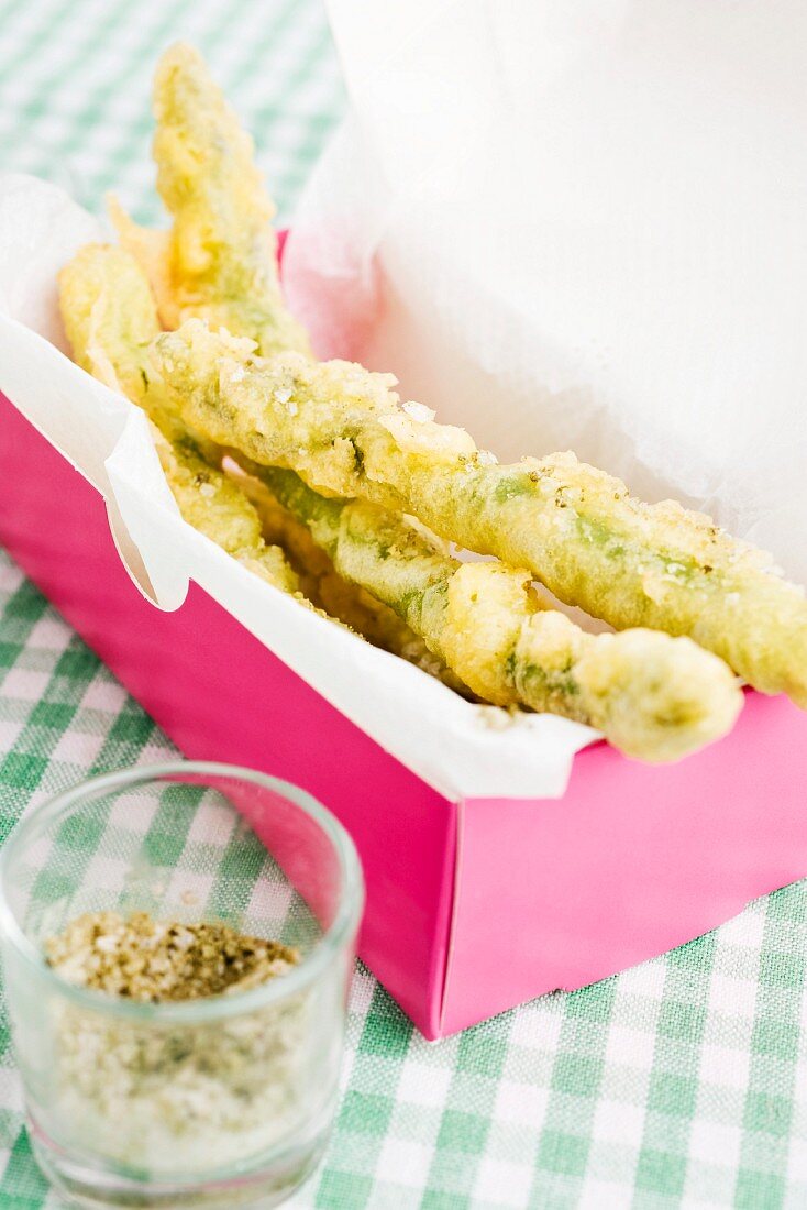 Asparagus tempura in a take away box