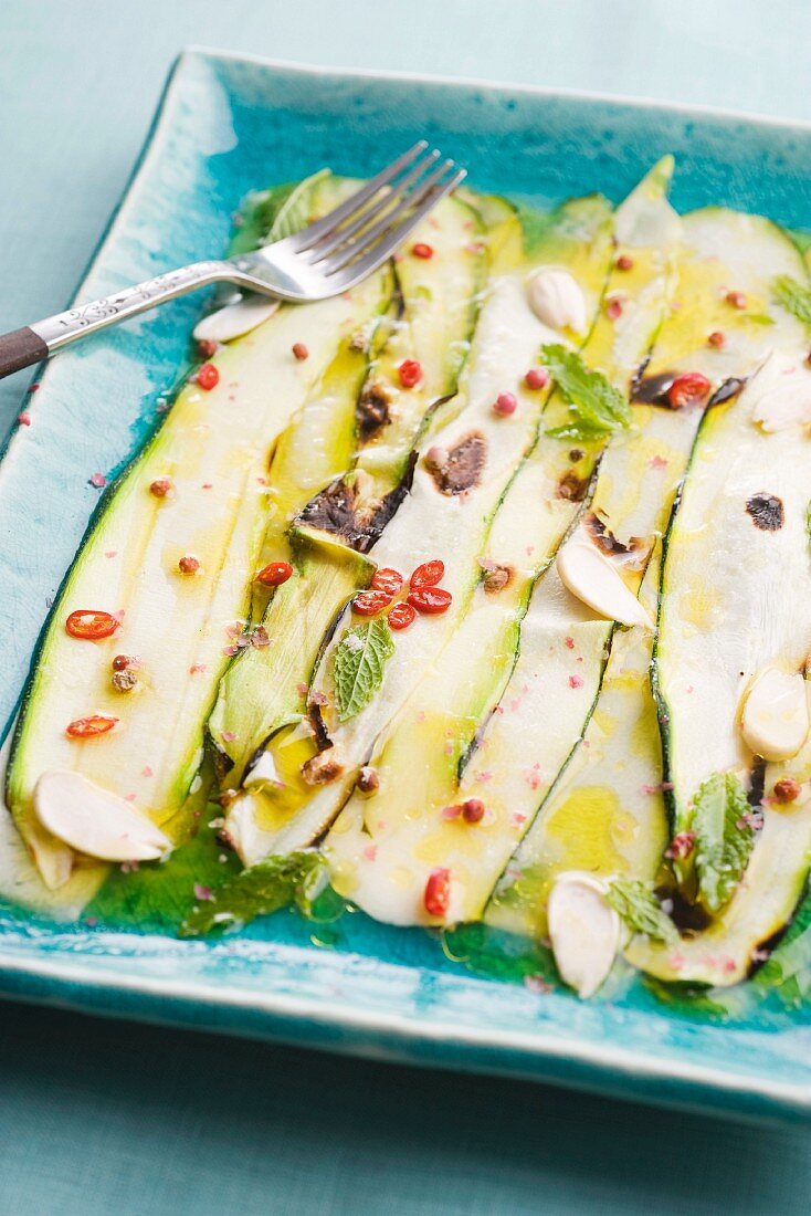 Marinated courgette strips with chilli and mint