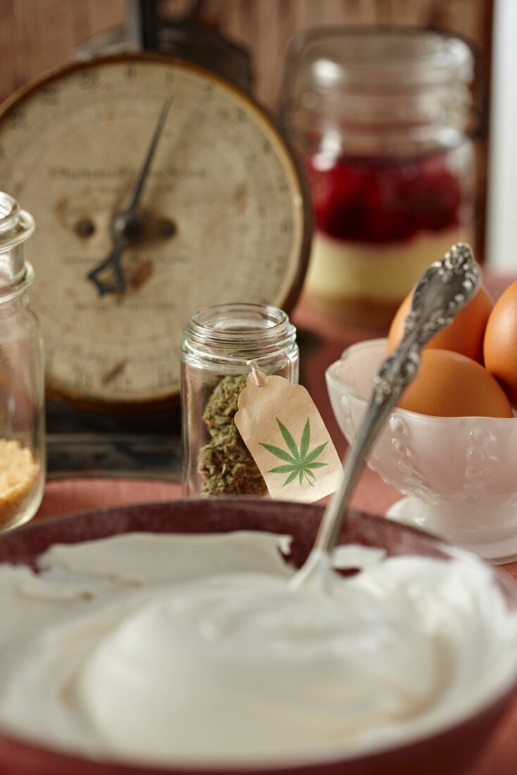 Cheesecake Filling in a Bowl; Marijuana Buds and Eggs