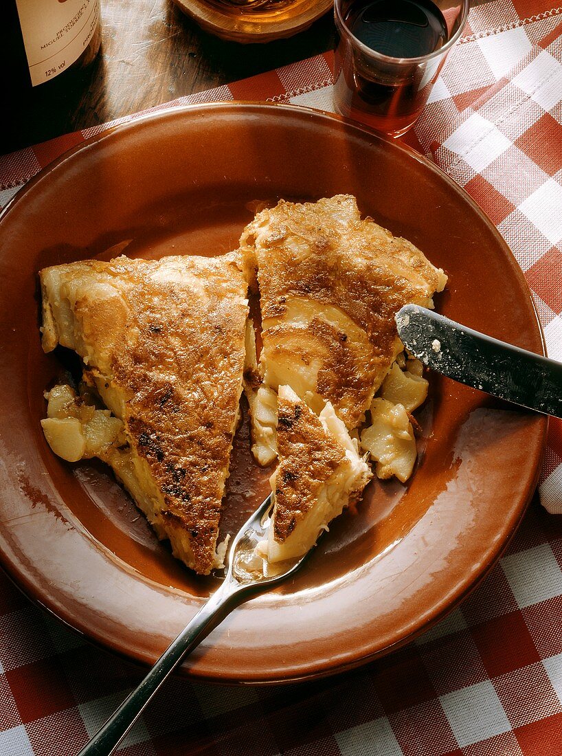 Two pieces of Tortilla de patatas - potato omelette