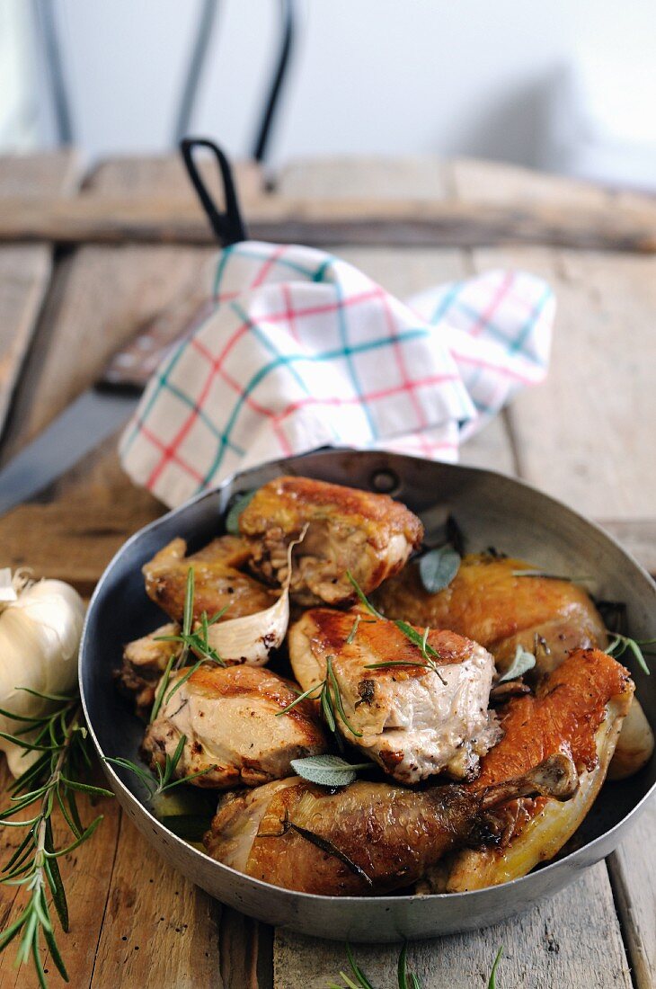 Fried guinea fowl with rosemary and sage