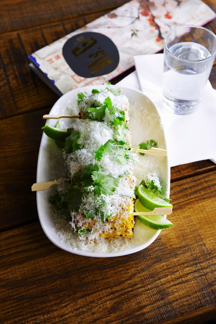 Barbecued corn on the cob with parmesan and lime
