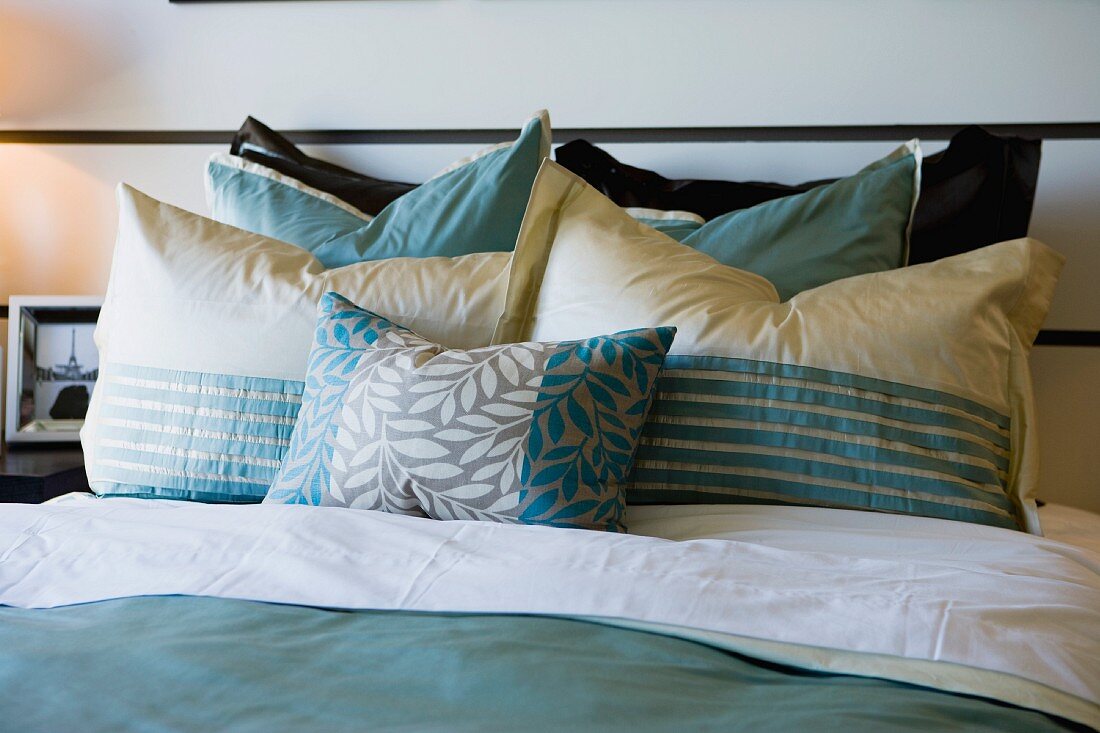 Collection of pillows on bed