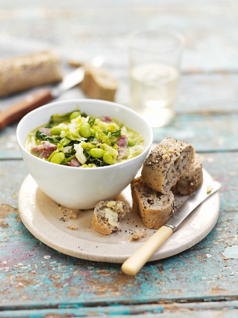 Green vegetable stew with marinated pork and bread