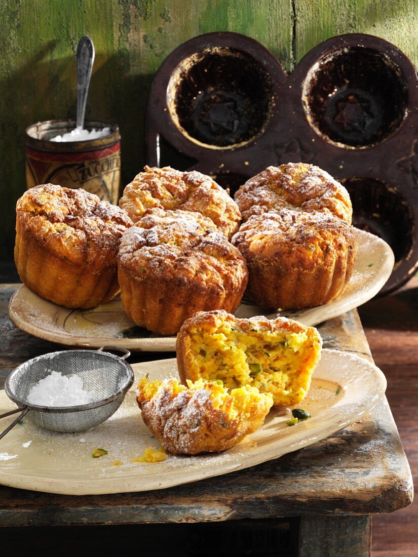 Mini carrot and courgette cakes dusted with icing sugar