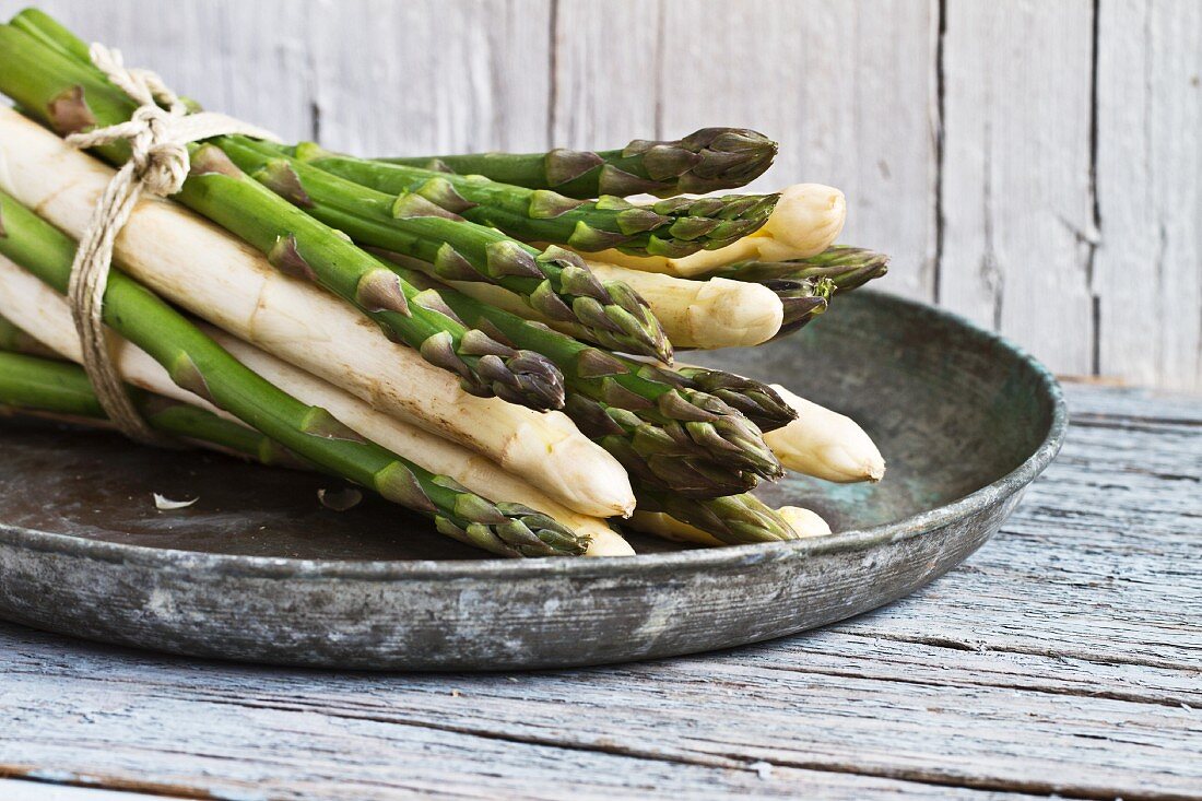 A bunch of asparagus in a bowl