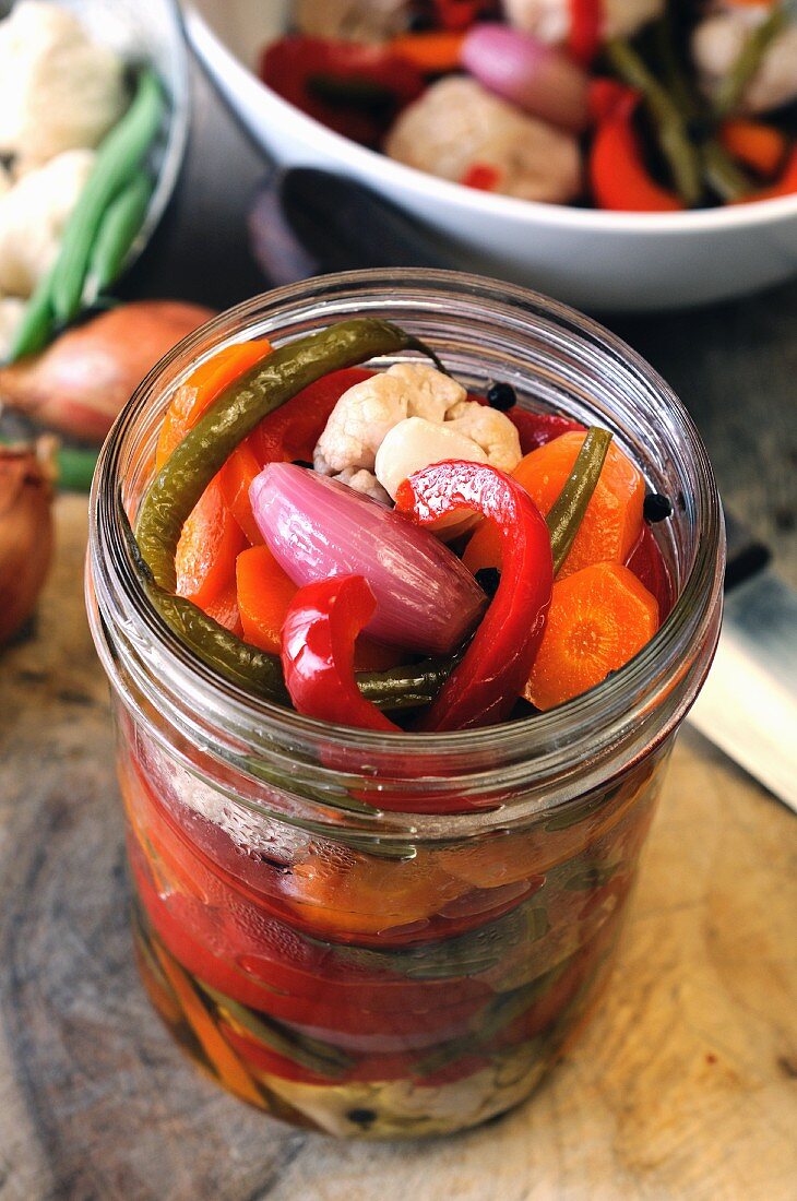 A jar of preserved vegetables
