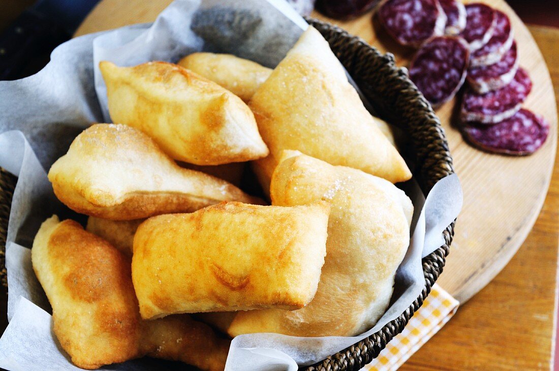 Torta fritta con salame (fried Italian pastries)