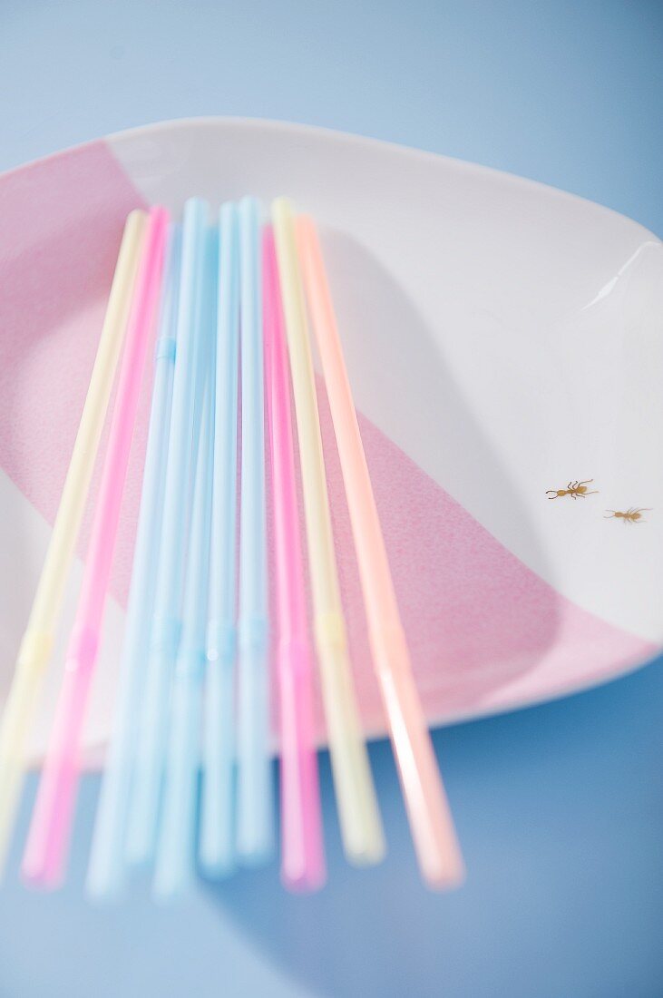 Drinking straws on a plate