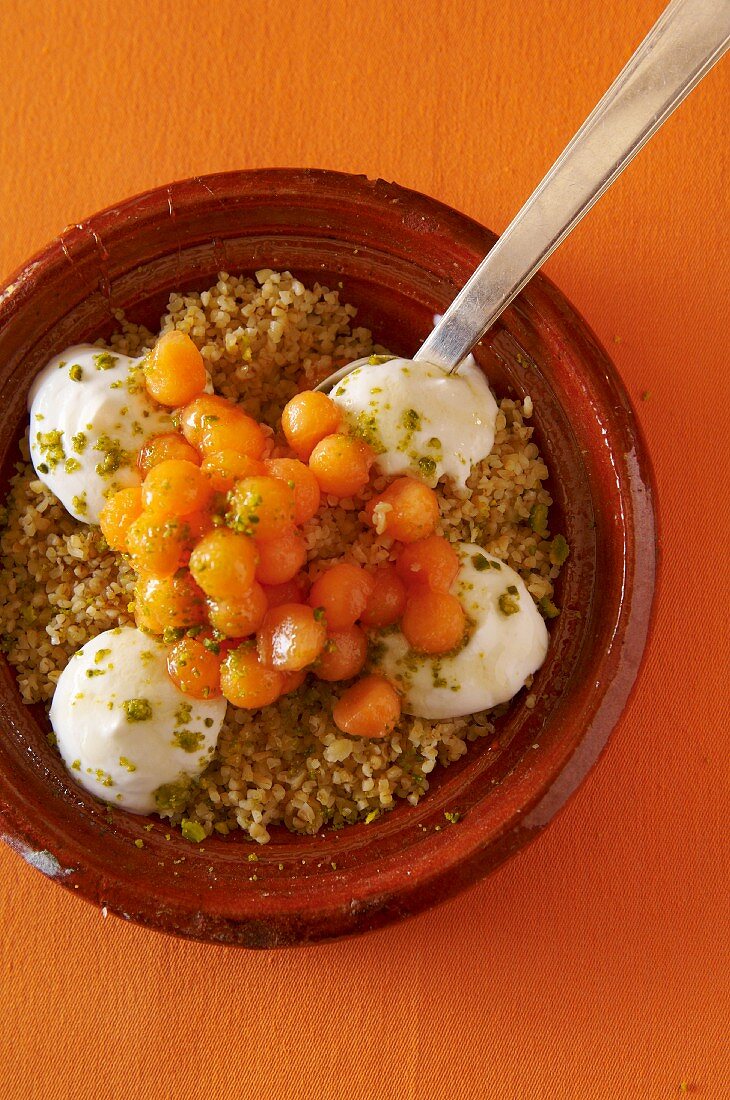 Sweet bulgur wheat with melon and honey