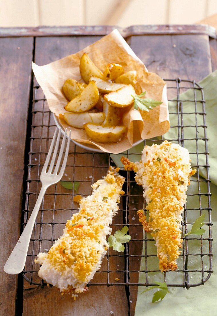 Breaded fish with potato wedges