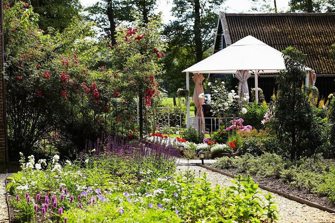 Pavilion in flowering garden