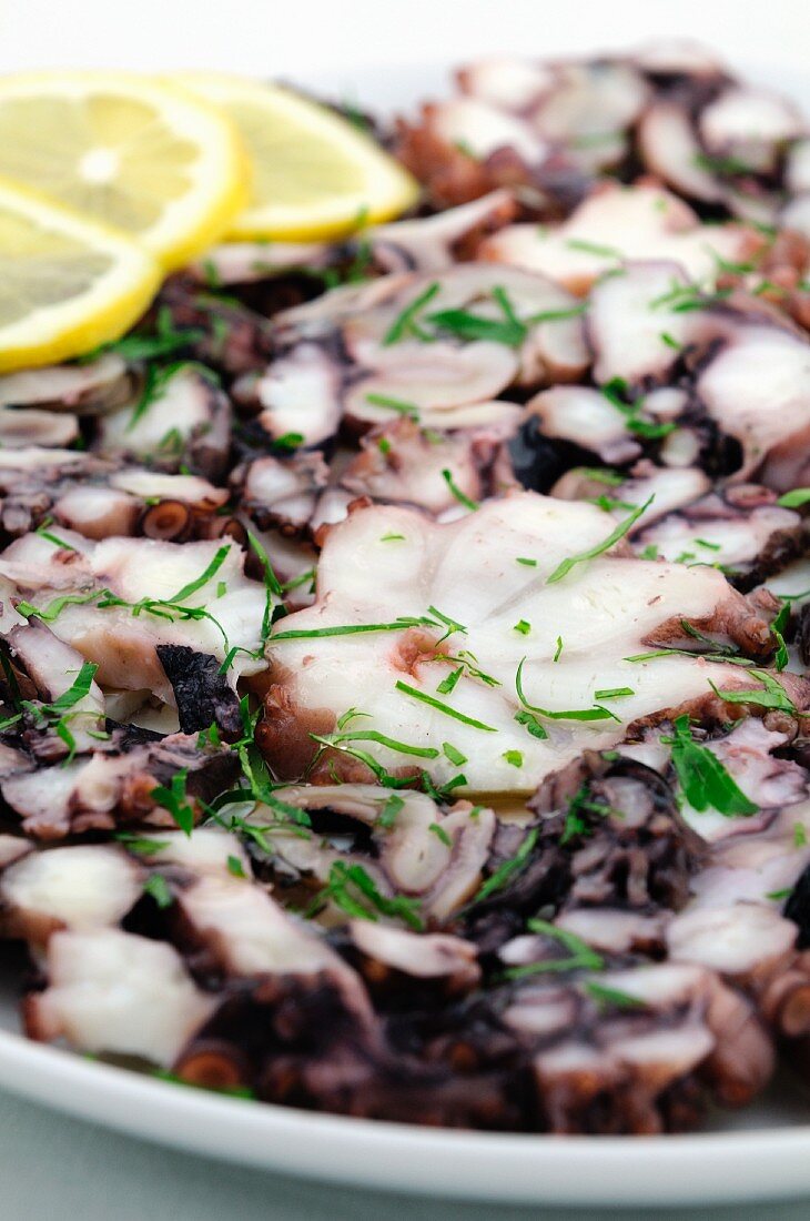 Squid carpaccio with herbs and lemon