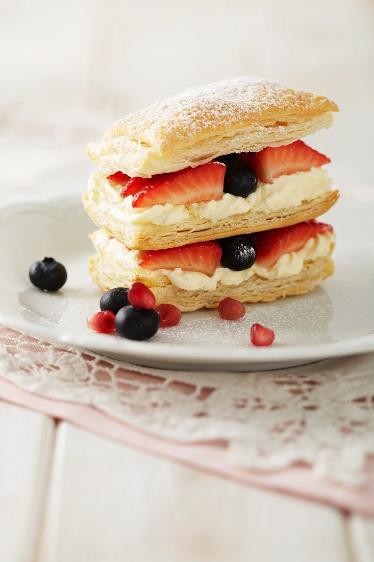 A cream and berry puff pastry tower