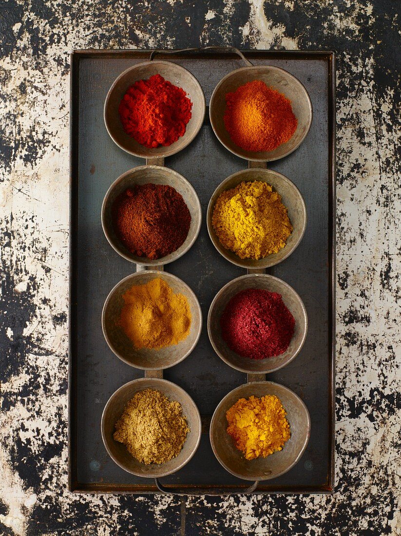 Assorted spices in small containers