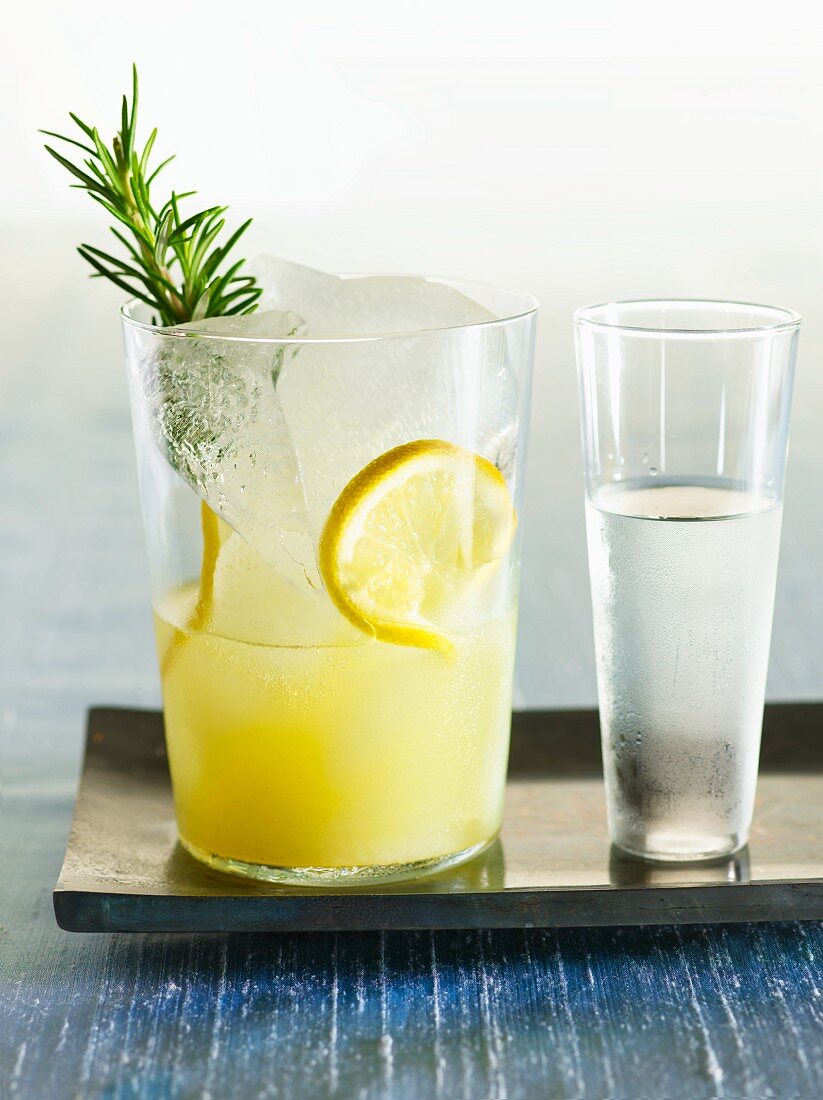 Glass of Lemonade with Rosemary; Shot Glass