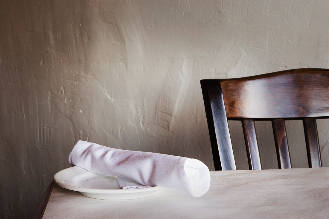 Restaurant Table with Napkin Rolled Silverware