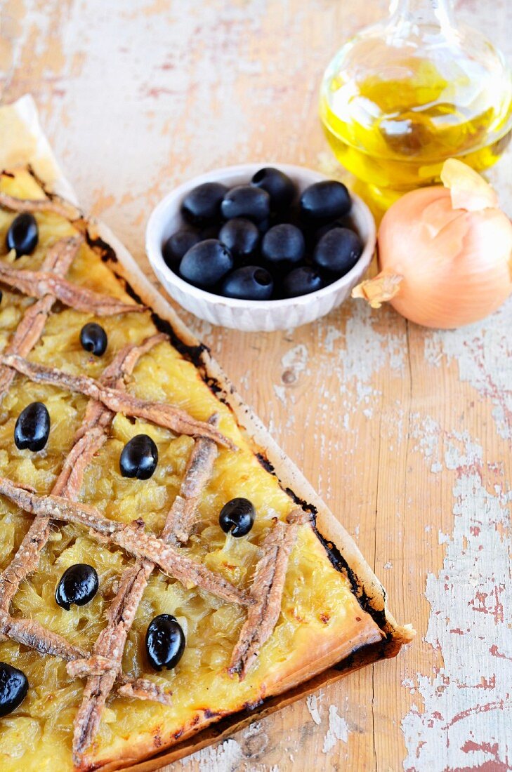 An onion, olive and anchovy quiche