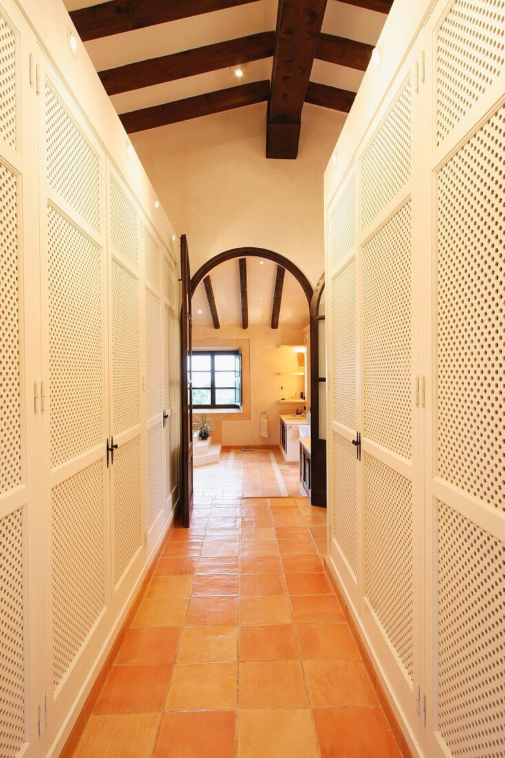 Hallway with closet space on both sides