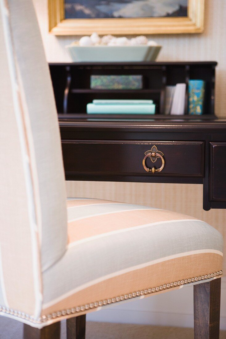 Detail of striped desk chair near home desk