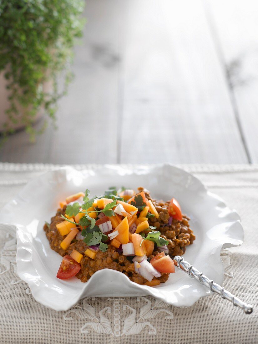 Lentil curry with papaya salsa