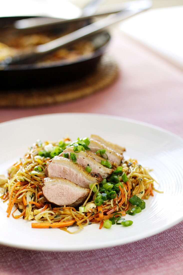 Crispy duck breast on fried vermicelli