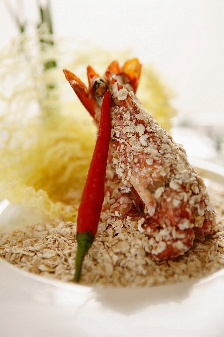 Hummer und Shrimps mit Haferflocken und Chilischote (China)