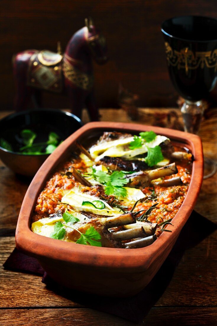 Lamb chops in a terracotta baking dish (Poland)