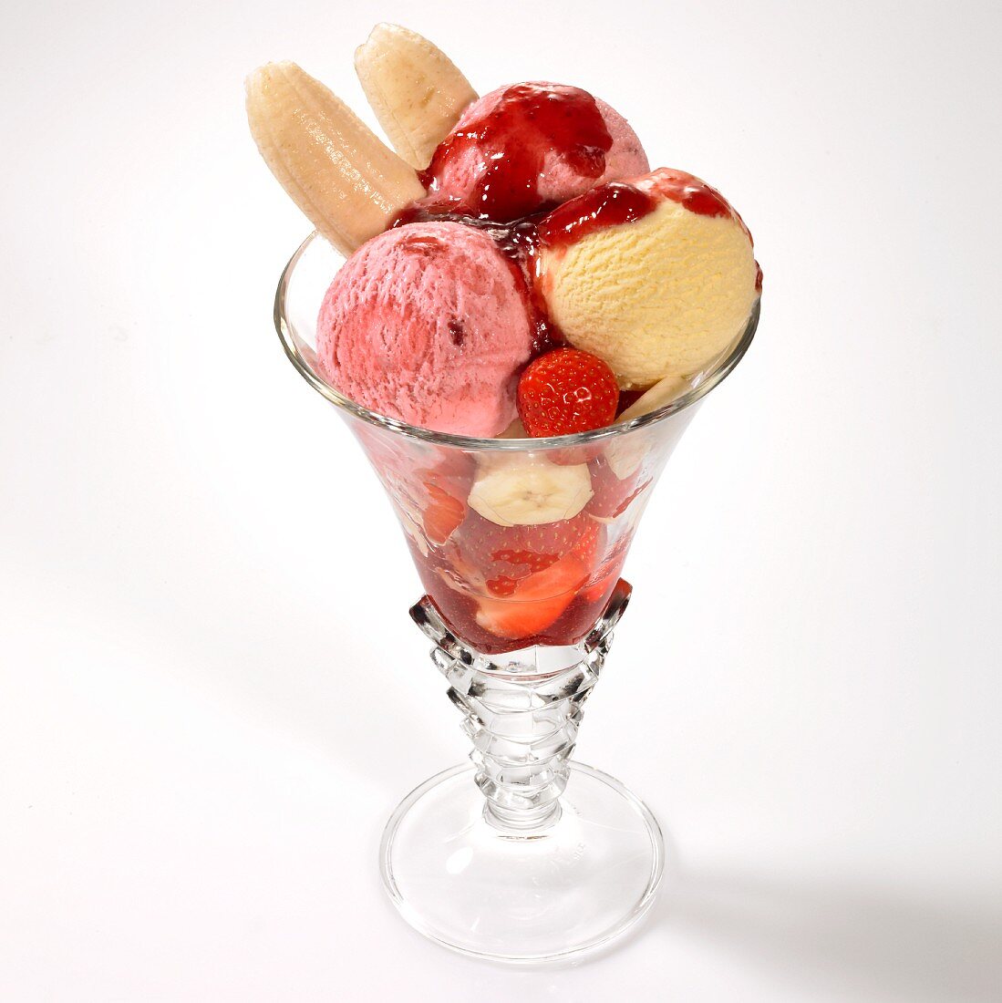 A strawberry and banana ice cream sundae