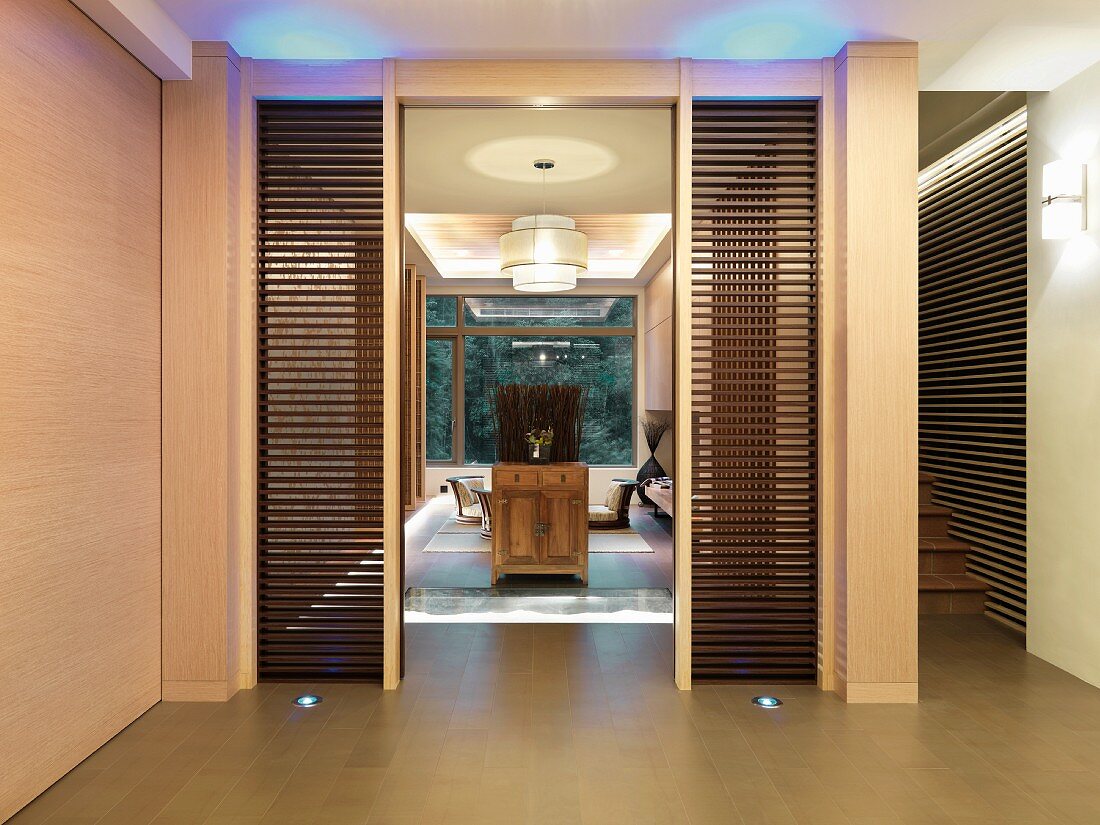 Doorway to modern oriental dining room