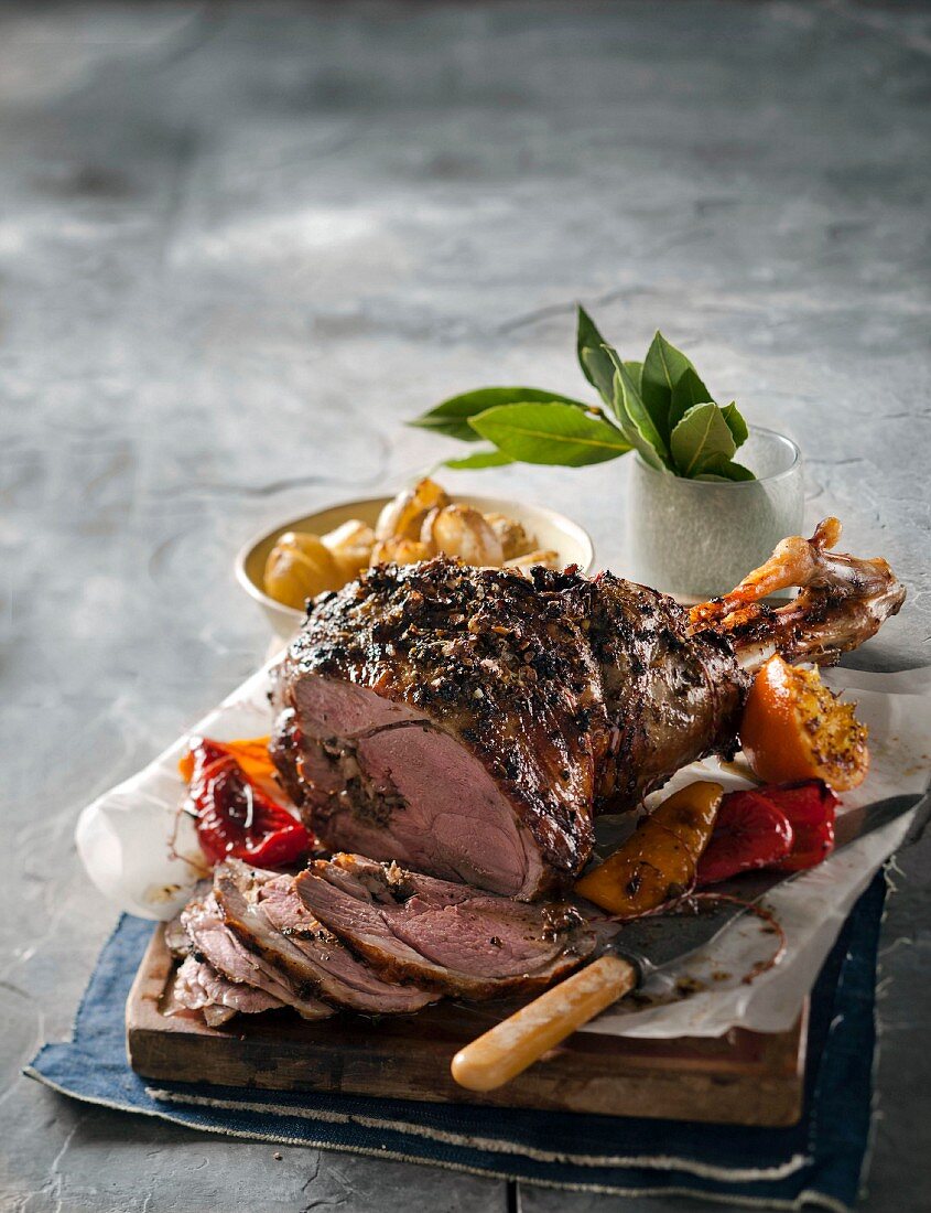 Leg of lamb with capers and chilli peppers for Easter