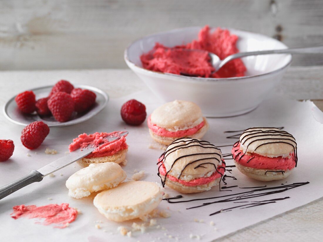 Raspberry macaroons with chocolate glaze