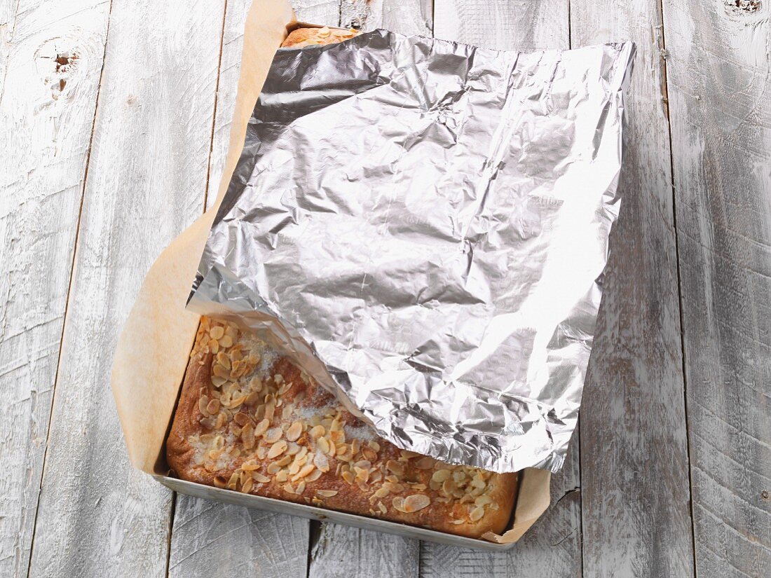 Butter cake covered with aluminium foil