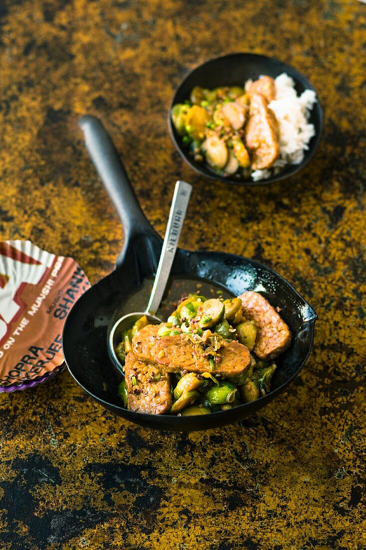 Fried spicy tempeh with Brussels sprouts