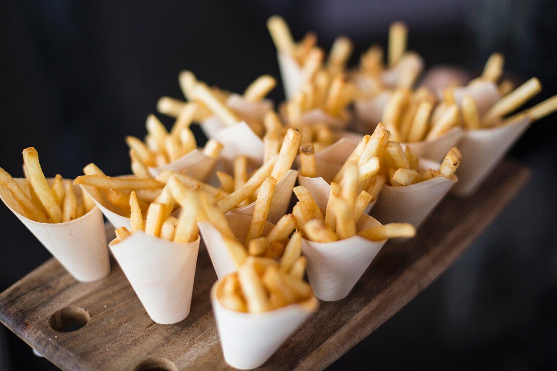 French fries in small paper cones