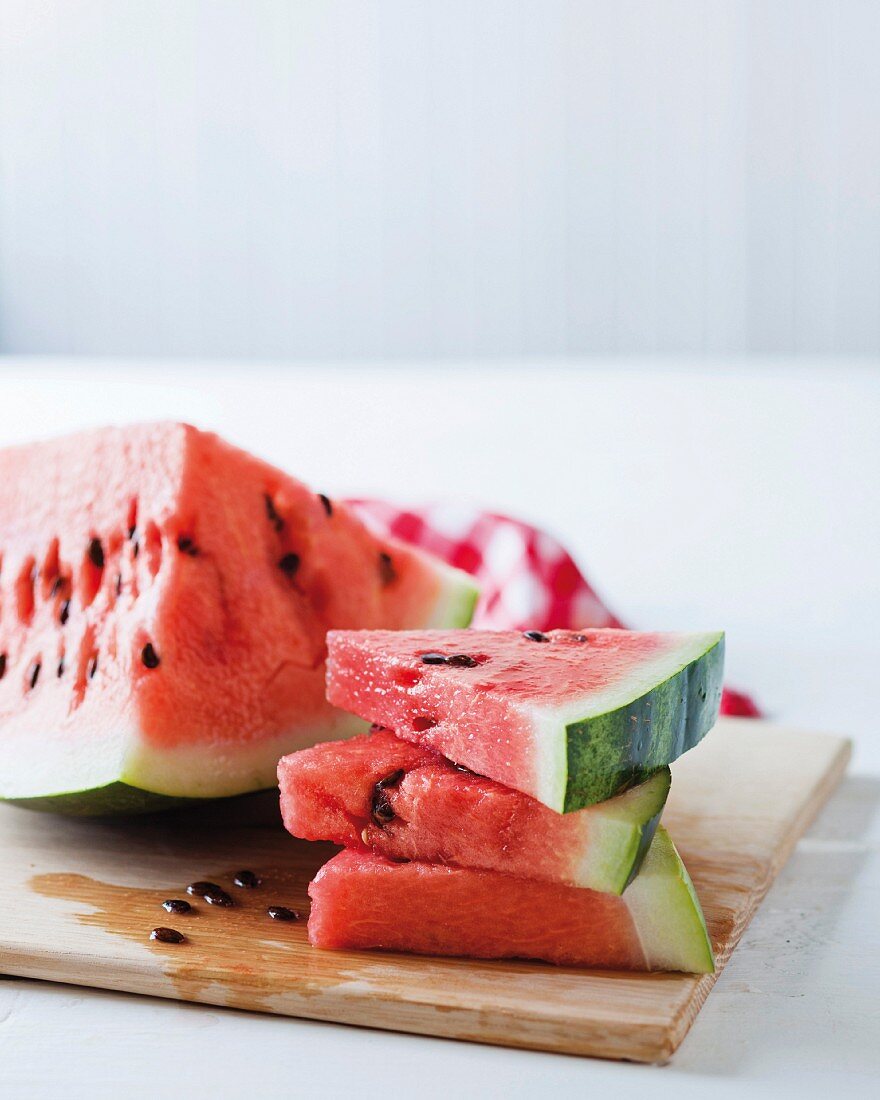 Sliced watermelon on a chopping board