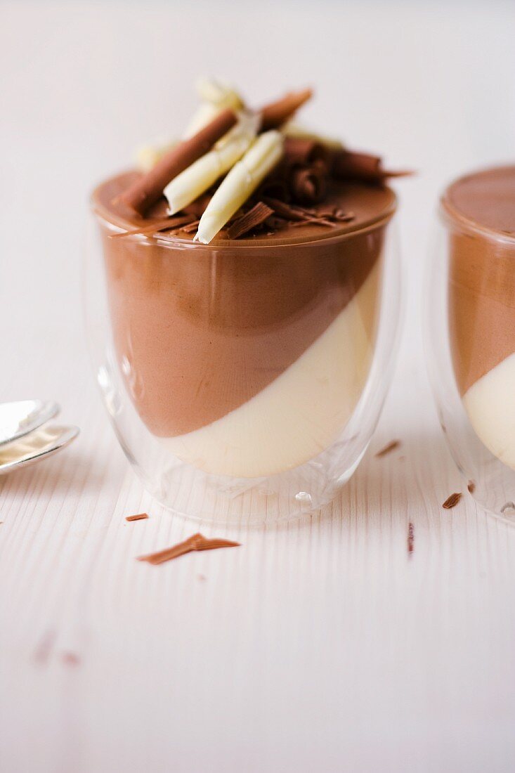 Ginger and chocolate mousse and chocolate and lemon mousse in glasses